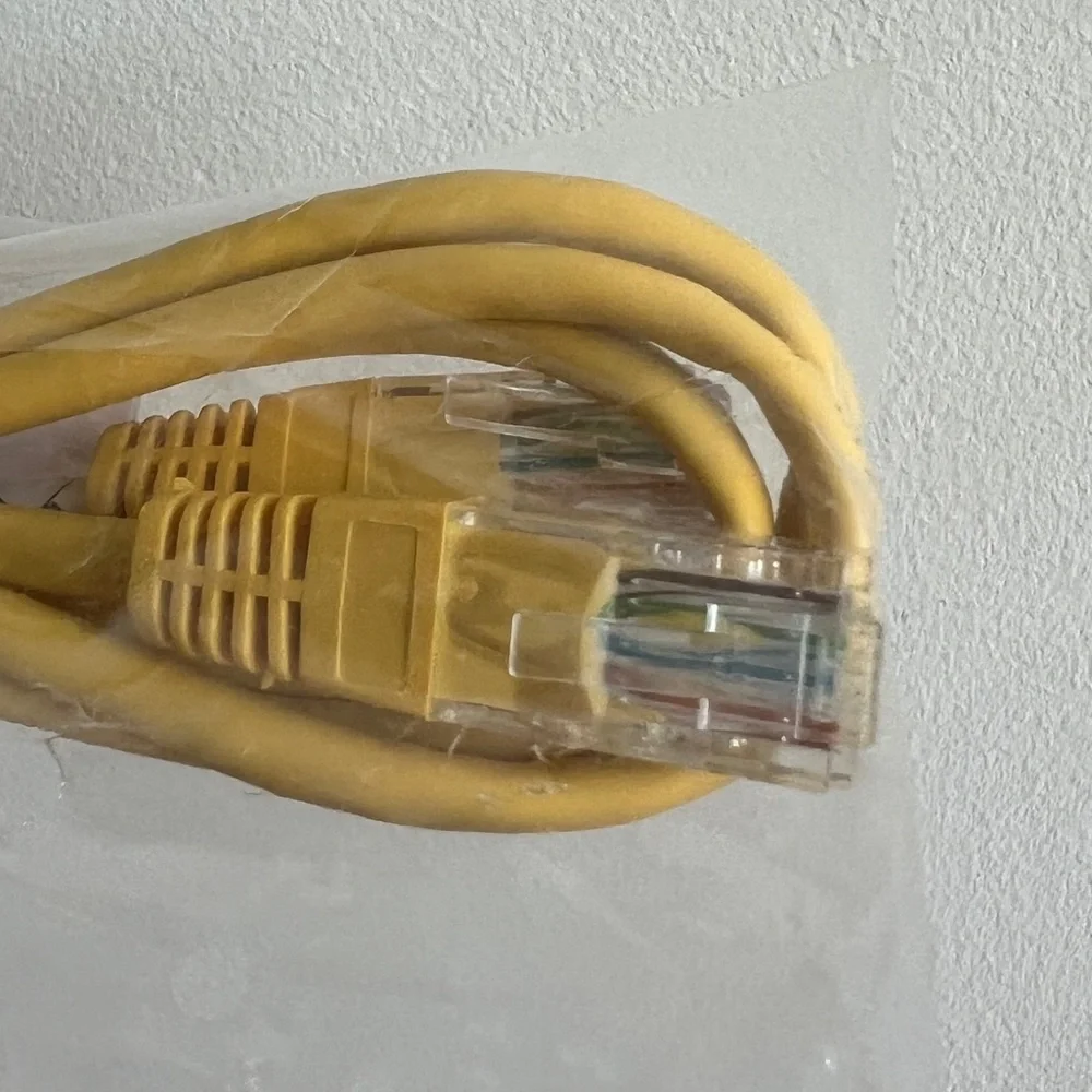 Yellow Ethernet network patch cable cord
